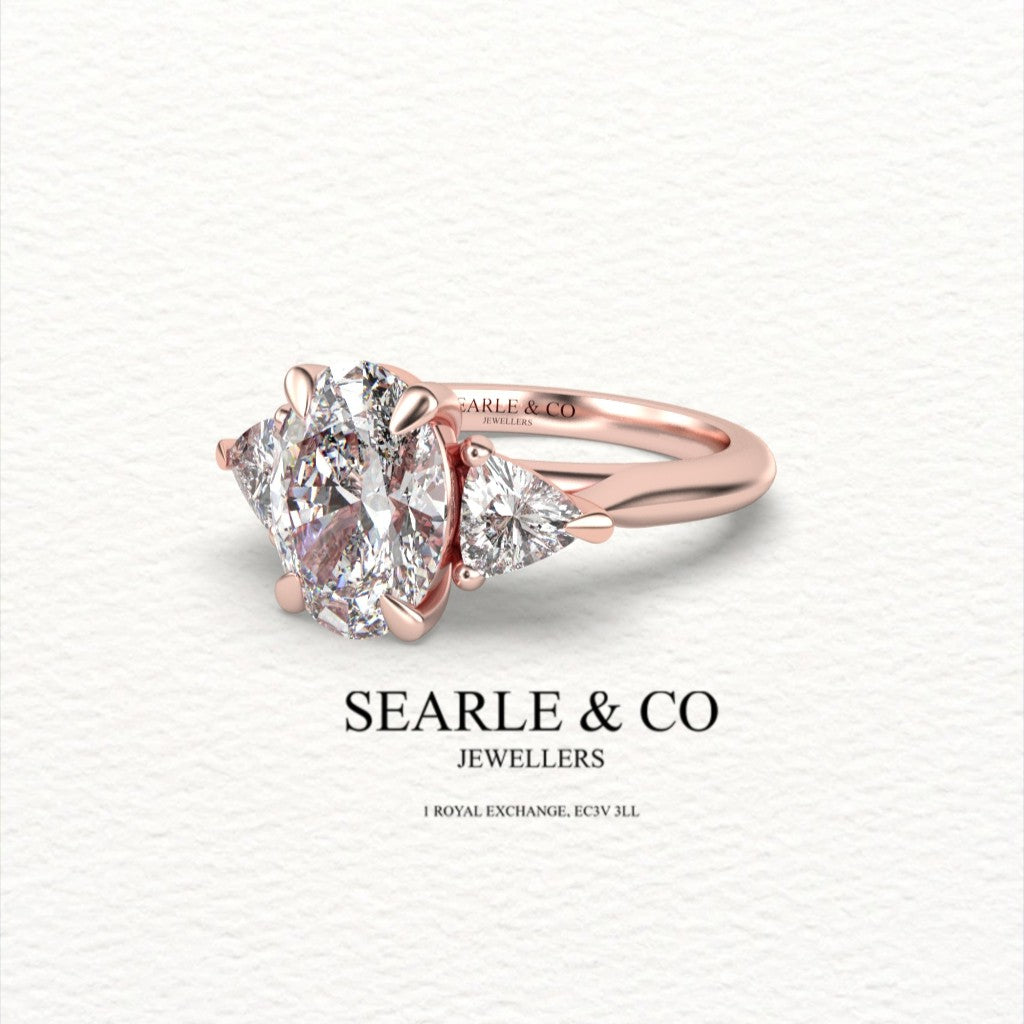 Oval & Trilliant Diamond Trilogy Engagement Ring